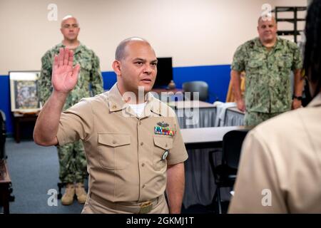 WASHINGTON, DC (May 27, 2021) – Chief Navy Counselor Eduardo Rivera recites the oath of enlistment onboard Washington Navy Yard. Stock Photo