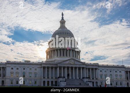Capitol Building in Washington, DC, USA with the sun setting behind the dome Stock Photo