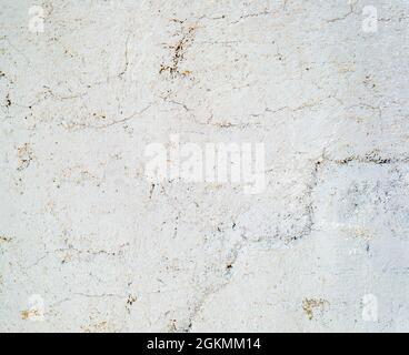 Cracked concrete painted wall background or texture. Close-up Stock Photo