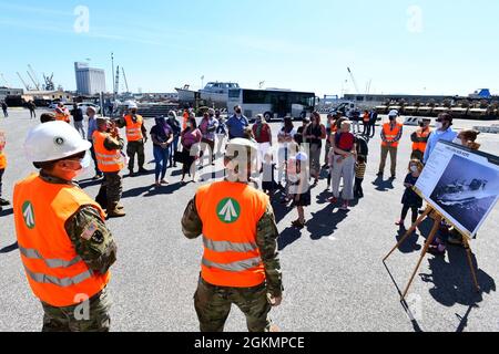 The 839th Transportation Battalion 'Key to the Mediterranean 'held a Family Day event at the port facility in Livorno, Italy, May 28, 2021. The 839th along with the members of its Italy Detachment invited family members to the port to observe port operations in support of the equipment upload to the USNS Bob Hope, a U.S. Military Sealift Command vessel. The families were able to see first-hand the vital mission that 839th Soldiers, Army civilians and host-nation professionals perform at ports in support of the U.S. European Command and U.S. Africa Command missions. Stock Photo