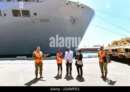 The 839th Transportation Battalion 'Key to the Mediterranean 'held a Family Day event at the port facility in Livorno, Italy, May 28, 2021. The 839th along with the members of its Italy Detachment invited family members to the port to observe port operations in support of the equipment upload to the USNS Bob Hope, a U.S. Military Sealift Command vessel. The families were able to see first-hand the vital mission that 839th Soldiers, Army civilians and host-nation professionals perform at ports in support of the U.S. European Command and U.S. Africa Command missions. Stock Photo