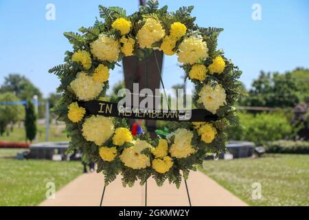 This Memorial Day, 101st Airborne Division (Air Assault) take time to remember those who made the ultimate sacrifice in a wreath laying ceremony.     In this ceremony 101st Airborne Division (Air Assault) command team, Maj. Gen. JP McGee and Command Sgt. Maj. Veronica Knapp honor the fallen U.S. military heroes who gave the ultimate sacrifice in duty to our nation by laying a wreath in front of the division's eternal flame. Stock Photo