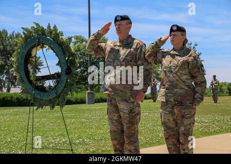 This Memorial Day, 101st Airborne Division (Air Assault) take time to remember those who made the ultimate sacrifice in a wreath laying ceremony.     In this ceremony 101st Airborne Division (Air Assault) command team, Maj. Gen. JP McGee and Command Sgt. Maj. Veronica Knapp honor the fallen U.S. military heroes who gave the ultimate sacrifice in duty to our nation by laying a wreath in front of the division's eternal flame. Stock Photo