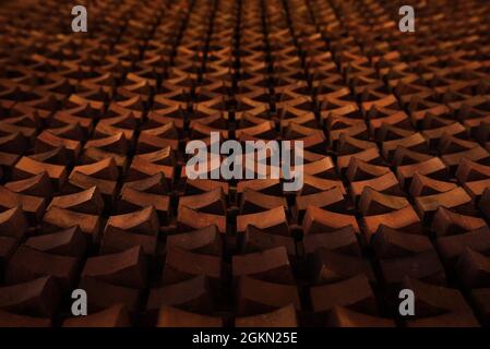Acoustic texture wall. Sound, noise, echo suppression wall, an alternative to hanging numerous panels in a large room / hall. Stock Photo