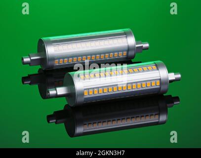 Linear R7S LED bulb, dimmable, on green background Stock Photo