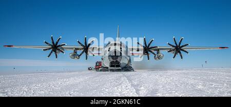 An LC-130 Skibird assigned to the 109th Airlift Wing sits on the ice runway at Raven Camp. Raven Camp is used to train members on landing on ice runways, polar airdrops and operating in the snow and ice conditions. Stock Photo