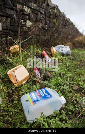 Litter on rural roadside, Northumberland national park, Northumberland, UK Stock Photo