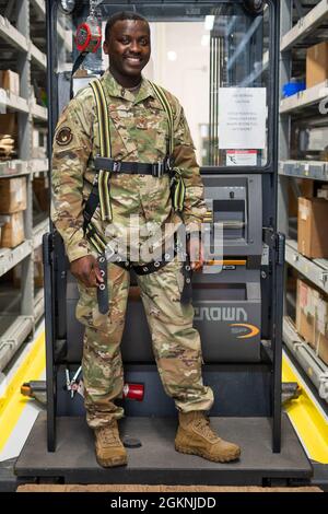 Staff Sergeant Salem Dogbe, a member of the Alaska Air National Guard, is a part of the Individual Equipment Element, Logistics Readiness Squadron, 168th Wing, Eielson Air Force Base, Alaska, June 6th, 2021. SSgt Dogbe and LRS are tasked with ensuring the Airmen of the 168th Wing are supplied with the equipment and clothing they require for mission success, especially in the arctic environment of Alaska. Stock Photo