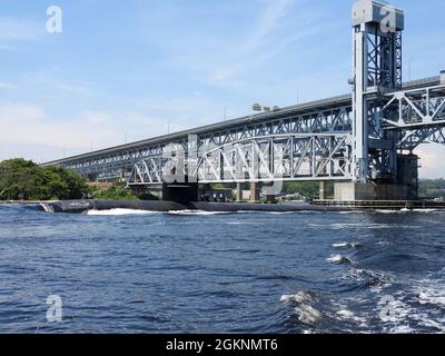 210608 -N-AY957-087 GROTON, Conn. (June 8, 2021) - The USS Providence (SSN 719) transits Thames River under the Gold Star Bridge in Groton, Conn., June 8. Providence and crew are part of Submarine Squadron (SUBRON) 12, whose mission is to provide attack submarines that are ready, willing, and able to meet the unique challenges of undersea combat and development operations in unforgiving environments across the globe. Stock Photo