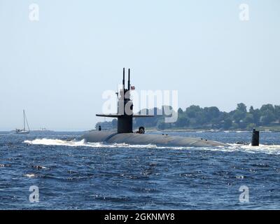 210608-N-AY957-115 GROTON, Conn. (June 8, 2021) - The USS Providence (SSN 719) transits Thames River under the Gold Star Bridge in Groton, Conn., June 8. Providence and crew are part of Submarine Squadron (SUBRON) 12, whose mission is to provide attack submarines that are ready, willing, and able to meet the unique challenges of undersea combat and development operations in unforgiving environments across the globe. Stock Photo