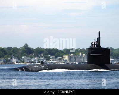 210608-N-AY957-127 GROTON, Conn. (June 8, 2021) - The USS Providence (SSN 719) transits Thames River under the Gold Star Bridge in Groton, Conn., June 8. Providence and crew are part of Submarine Squadron (SUBRON) 12, whose mission is to provide attack submarines that are ready, willing, and able to meet the unique challenges of undersea combat and development operations in unforgiving environments across the globe. Stock Photo