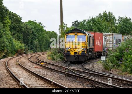 A Class 66 heavy freight diesel railway locomotive pulling a train ...