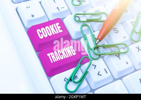 Handwriting text Cookie Tracking. Word for Data stored in the user s is computer by website being visited Computer Engineering Concept, Abstract Stock Photo