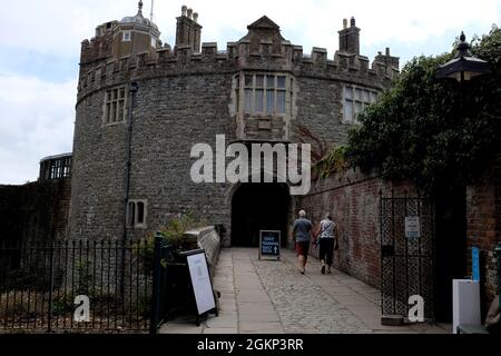 couple walking up to the entrance of walmer castle in coastal town of deal,east kent,uk september 2021