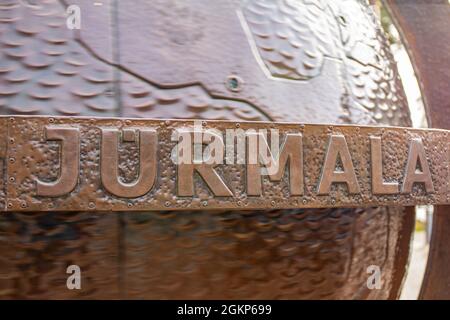 Latvia, Europe - MAY 13 2020: biggest rotating bronze globe, Jurmala Latvian resort city on the Gulf of Riga, known for wooden villas, Soviet era USSR Stock Photo