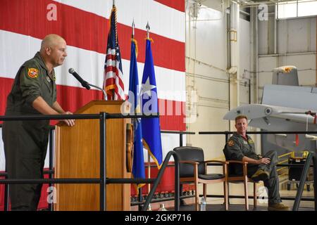 Maj. Gen. Brian Borgen, left, a former commander of the 442d Fighter Wing, officiates the general officer flag unfurling ceremony to mark the promotion of Brig. Gen. Mike Schultz, the current 442 FW commander, June 11, 2021, in the 5-Bay hangar on Whiteman Air Force Base, Mo. Schultz served under Borgen as the commander of the 476th Fighter Group at Moody Air Force Base when Borgen led the 442 FW, and again as 442 FW commander when Borgen helmed 10th Air Force. Stock Photo