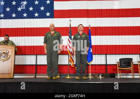 Maj. Gen. Brian Borgen, left, a former commander of the 442d Fighter Wing, officiates the general officer flag unfurling ceremony to mark the promotion of Brig. Gen. Mike Schultz, the current 442 FW commander, June 11, 2021, in the 5-Bay hangar on Whiteman Air Force Base, Mo. Schultz served under Borgen as the commander of the 476th Fighter Group at Moody Air Force Base when Borgen led the 442 FW, and again as 442 FW commander when Borgen helmed 10th Air Force. Stock Photo