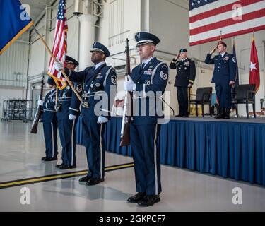 The 123rd Airlift Wing Honor Guard presents the colors during a ceremony at the Kentucky Air National Guard Base in Louisville, Ky., June 12, 2021, to bestow the Airman’s Medal to Master Sgt. Daniel Keller, a combat controller in the 123rd Special Tactics Squadron. Keller earned the award for heroism in recognition of his actions to save human life following a traffic accident near Louisville in 2018. Stock Photo