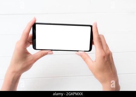 Template of modern smartphone in hands for your design Stock Photo