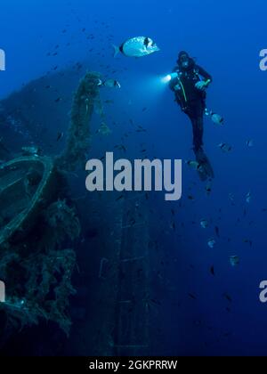 Diver at the MS Zenobia shipwreck. MS Zenobia was a Swedish built Challenger-class RO-RO ferry launched in 1979 that capsized and sank close to Larnac Stock Photo