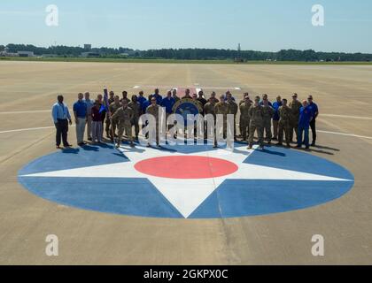 Airmen from the 43rd Operations Support Squadron, Pope Army Airfield, North Carolina, pose for a team photo June 15, 2021. Stock Photo