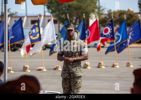 U.S. Marine Corps Sgt. Maj. Oranjel A. Leavy, incoming sergeant major, 15th Marine Expeditionary Unit addresses the audience during a relief and appointment ceremony at Marine Corps Base Camp Pendleton, California, June 17, 2021. A relief and appointment ceremony is a military tradition that represents the formal transfer of responsibilities from one sergeant major to another. Stock Photo