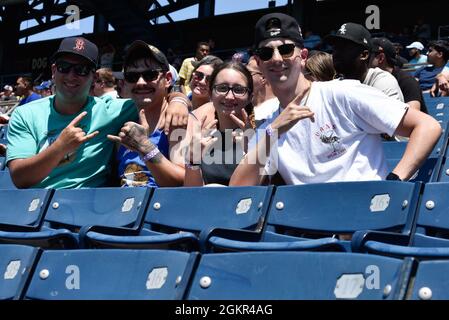 U.S. Navy Sailors pose for photo during a Norfolk Tides baseball game at Harbor Park, for a Morale, Welfare and Recreation sponsored event, in Norfolk, Virginia, June 17, 2021. The John C. Stennis (CVN 74) is in Newport News Shipyard working alongside NNS, NAVSEA and contractors conducting Refueling and Complex Overhaul as part of the mission to deliver the warship back in the fight, on time and on budget, to resume its duty of defending the United States. Stock Photo