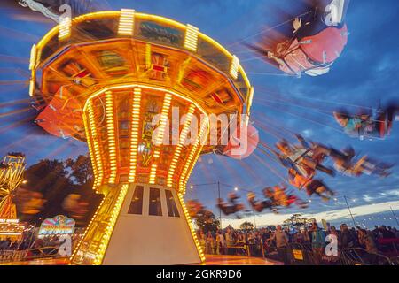 The merry-go-round at Camp Bestival, an annual family-friendly music festival, held in July, Lulworth, Dorset, England, United Kingdom, Europe Stock Photo