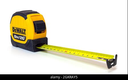 SWINDON, UK - SEPTEMBER 15, 2021: DeWalt Builders Tape Measure on a white background Stock Photo