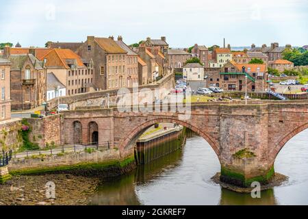 View of the Old Bridge over River Tweed and town houses, Berwick-upon-Tweed, Northumberland, England, United Kingdom, Europe Stock Photo