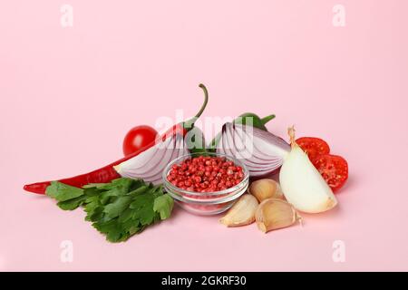 Different spicy vegetables on pink background, close up Stock Photo