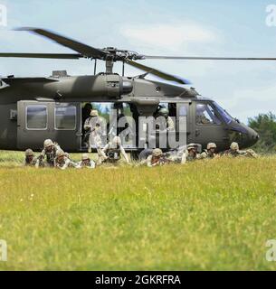 Romanian soldiers conduct an Administrative Boundary Line lane during ...