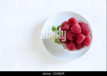 Fresh raspberries isolated on white background. Directly above. Stock Photo