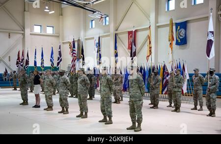 A formation of troops stands at ease during a Change of Command ceremony, June 22, 2021. Maj. Gen. Michael Talley, Commanding General of the U.S. Army Medical Research and Development Command and Fort Detrick, Maryland, relinquished command to Brig. Gen. Anthony McQueen. Stock Photo