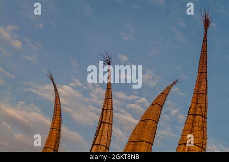 Traditional reed boats on a beach in Huanchaco, Peru. Stock Photo