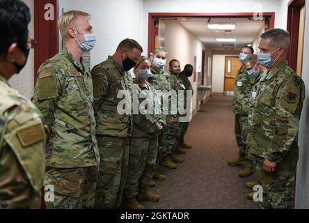 Lt. Gen. Timothy Haugh, 16th Air Force commander, stands with his wife ...