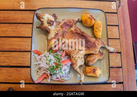 Roasted guinea pig, traditional meal in Peru Stock Photo