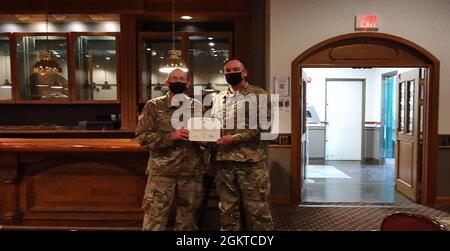 Far East District Commander, COL Christopher Crary, presents SSG ...