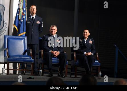 Col. Brian Moore and Col. Lindsay Droz participate in the 78th Air Base Wing change of command ceremony at the Museum of Aviation at Robins Air Force Base, Georgia, June 29, 2021. At the ceremony, Col. Lindsay Droz accepted command of the wing consisting of more than 2,700 personnel assigned to three groups, a communications directorate, an operations squadron, a comptroller squadron and 17 wing staff agencies. Stock Photo