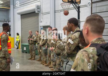 Airmen from the 43rd Air Mobility Operations Group, Pope Army Airfield, North Carolina, conduct a mobility exercise involving members at all levels simulating strategic, tactical, and operational deployment actions. The June 29, 2021, exercise is key to ensuring that the U.S. Air Force can project airpower anytime, anywhere. Stock Photo