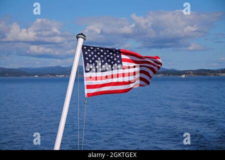 The stars and stripes flag on the ferry from Canada to the USA in Victoria Stock Photo