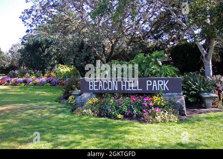 Beacon Hill Park sign, flowers and trees in Victoria in British Columbia Stock Photo