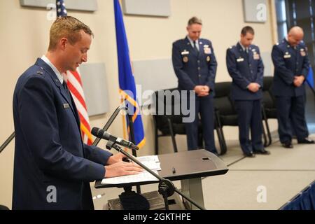 Chaplain Capt. Daniel Jones gives the invocation for the 68th Network Warfare Squadron during the Change of Command Ceremony June 30. 2021 at the Transport Security Administration Center, Joint Base San Antonio-Lackland, Texas. Lt. Col. Russell Dabel transferred command to Lt. Col. Joseph Citro. Col. Joshua Rockhill presided over the ceremony. Stock Photo