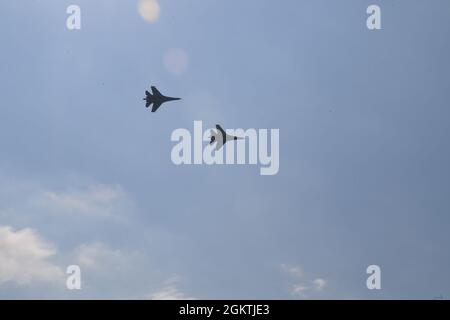 210630-N-VP310-289  MYKOLAIV MILITARY AIRBASE, Ukraine (June 30, 2021) Ukrainian Su-27 Flankers conduct a fly by as part of an air demonstration on Mykolaiv Military Airbase, Ukraine, June 30, 2021 Exercise Sea Breeze is a multinational maritime exercise cohosted by the U.S. Sixth Fleet and the Ukrainian Navy since 1997. Sea Breeze 2021 is designed to enhance interoperability of participating nations and strengthens maritime security and peace in the region. Stock Photo