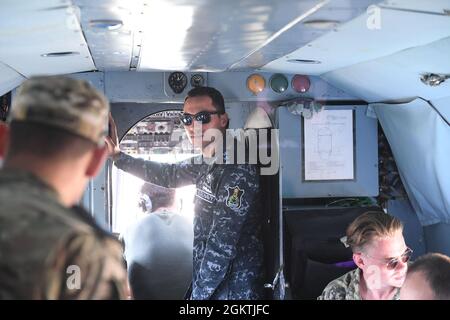 210630-N-VP310-0782  ODESA, Ukraine (June 30, 2021) Egyptian, United Arab Emirates, Canadian and Turkish military officers ride a Ukrainian Mi-8 Helicopter after an air demonstration for Exercise Sea Breeze 2021 Odesa, Ukraine, June 30, 2021. Exercise Sea Breeze is a multinational maritime exercise cohosted by the U.S. Sixth Fleet and the Ukrainian Navy since 1997. Sea Breeze 2021 is designed to enhance interoperability of participating nations and strengthens maritime security and peace in the region. Stock Photo