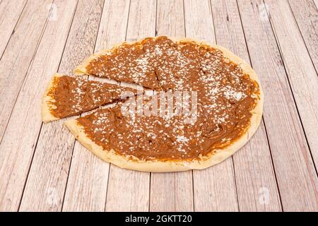Sweet family Italian pizza with nutella and icing sugar Stock Photo