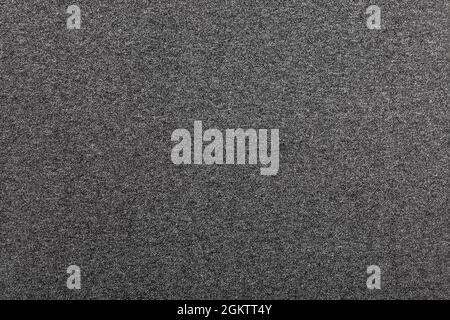 Heather dark grey knitted fabric made of melange mixed yarn textured background Stock Photo
