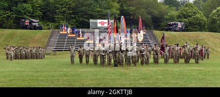 U.S. Army officers and colors with the 30th Medical Brigade render honors during the 30th Medical Brigade change of command ceremony, July 01, 2021, 2021 at Sembach, Germany. Col. Jordan V. Henderson III assumed command of the unit from Col. Jason S. Wieman Stock Photo