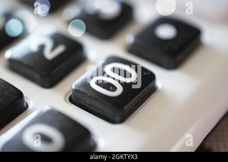 Simple Calculator with big buttons, numbers close up Stock Photo