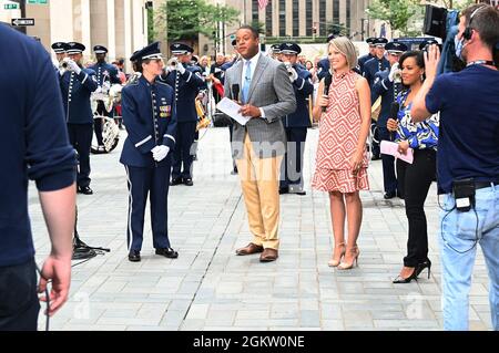 U.S. Air Force Capt. Christina Muncey, premier band flight commander and associate conductor with The United States Air Force Band, talks to TODAY Show hosts during a live interview on the TODAY Show in New York City July 2, 2021. The official ceremonial ensemble comprises 41 active-duty Airmen who provide musical support for funerals at Arlington National Cemetery, arrivals for foreign heads of state at the White House and Pentagon, patriotic programs, changes of command, retirements, and awards ceremonies.